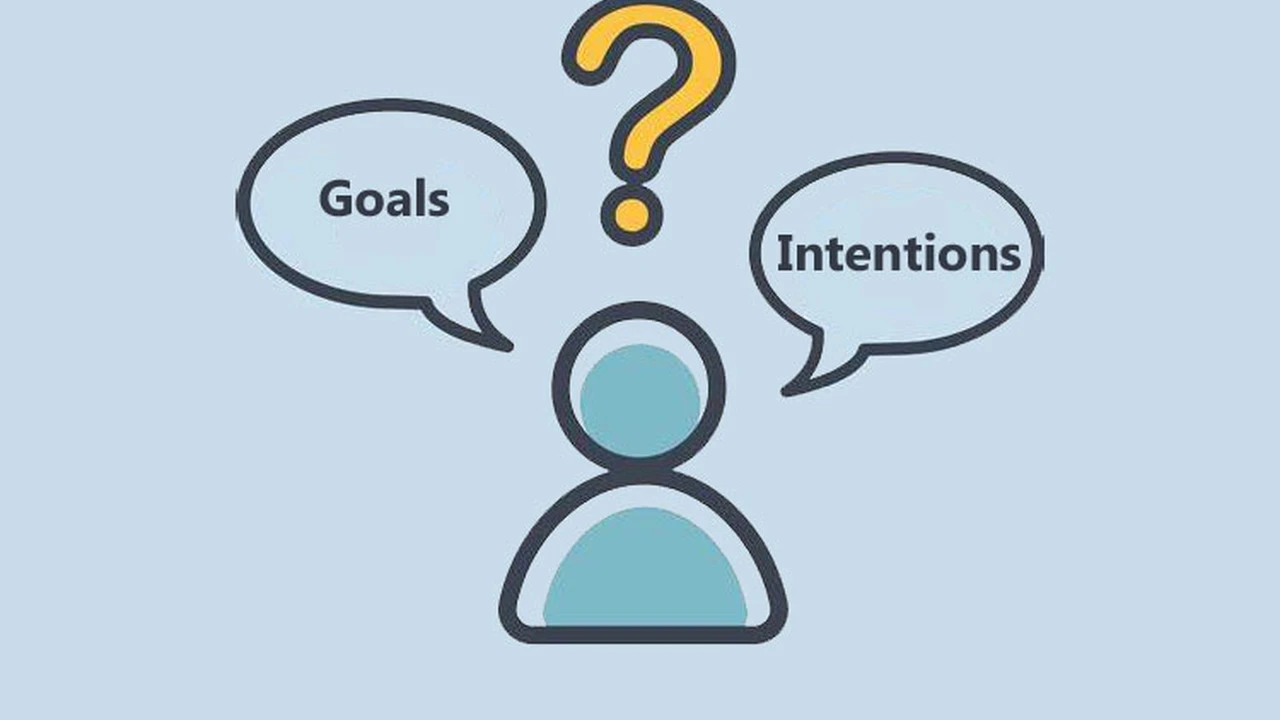 Close up on a plate of mashed potatoes, topped with baked pork chops with cream of mushroom soup, and a side of green beans.